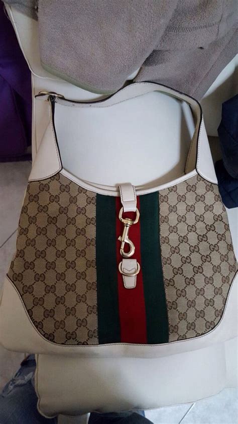 borsa gucci come riconoscere un falso|Come riconoscere una borsa Gucci originale da una falsa.